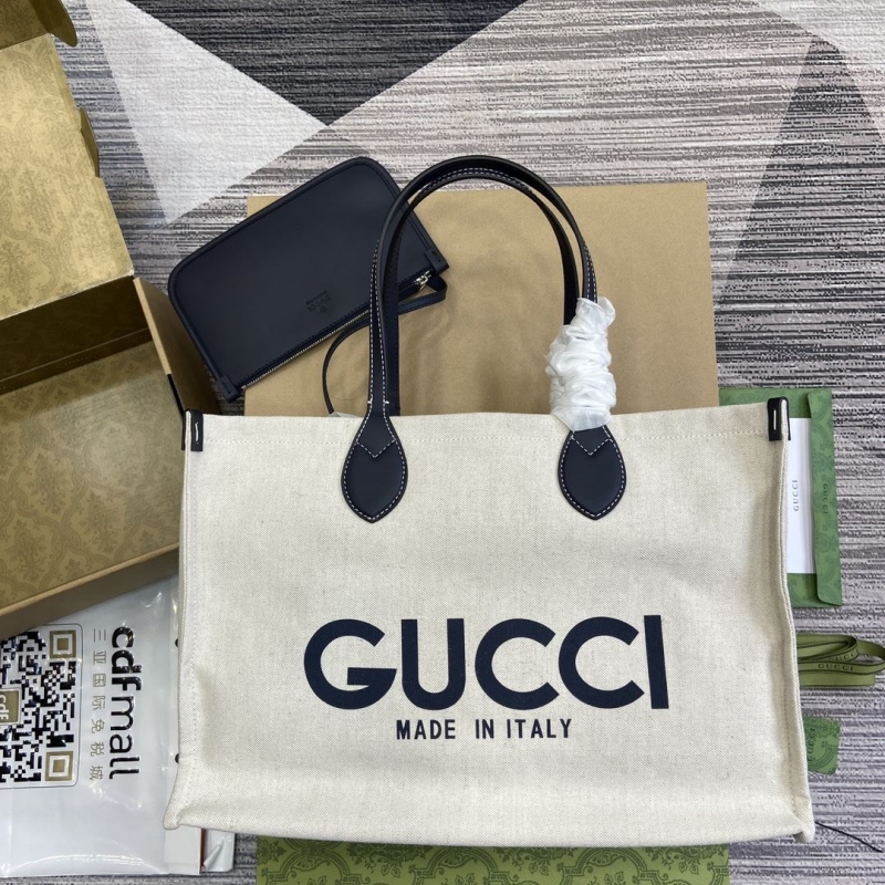 G*u*i shopping bags